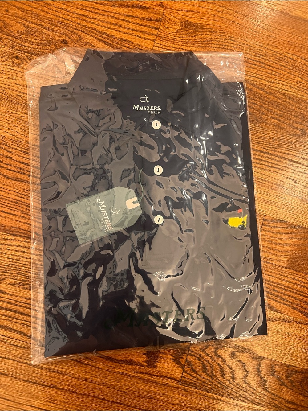 Masters Tech Men’s Navy Polo with Yellow Logo